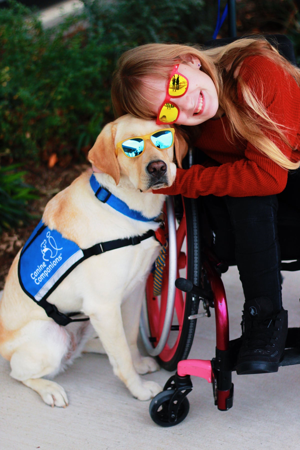 Little girl with canine companion service dog wearing sunnies shades polarized kids sunglasses