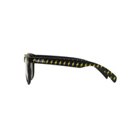 Side view of kids sunglasses in a lightning bolt print 