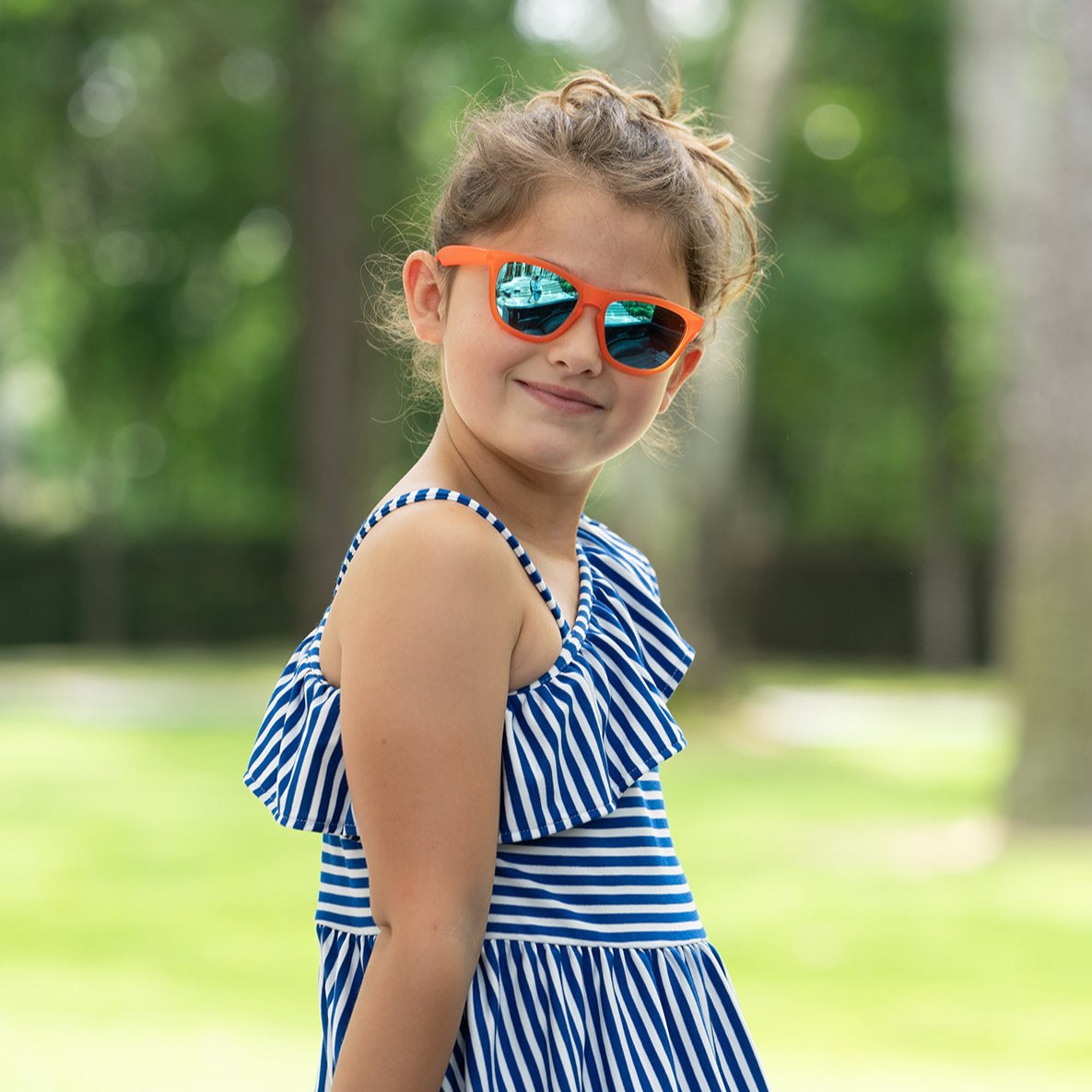 Polarized sunnies shades in frame Chillin like a villain on a cute little girl in orange frames and reflective blue lenses