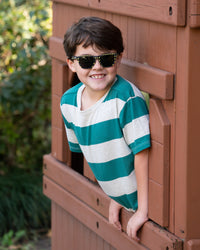 Thumbnail for Little boy wearing Sunnies Shades kids polarized sunglasses in a black frame with lightning bolts and non-reflective black lenses.