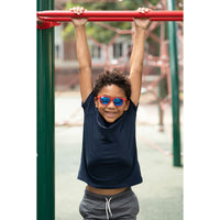 Thumbnail for Little boy hanging from monkey bars wearing sunnies red polarized kids sunglasses